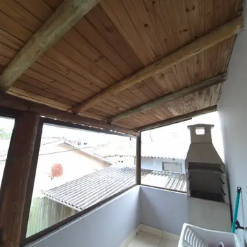 Espaço de churrasqueira da Casa de Cima